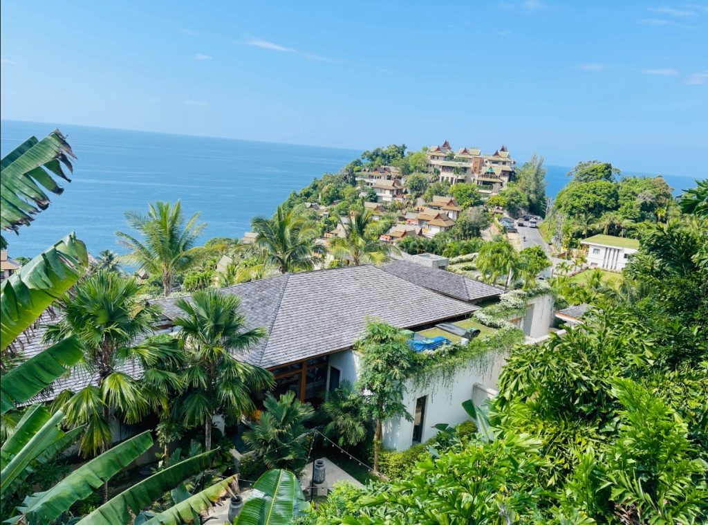 Aerial view of Bangtao hillside villas near the coast, popular for Airbnb rentals in Phuket