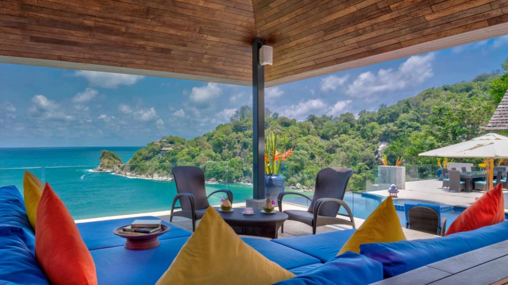 Oceanview villa in Surin, Phuket with luxury outdoor seating and pool overlooking the Andaman Sea