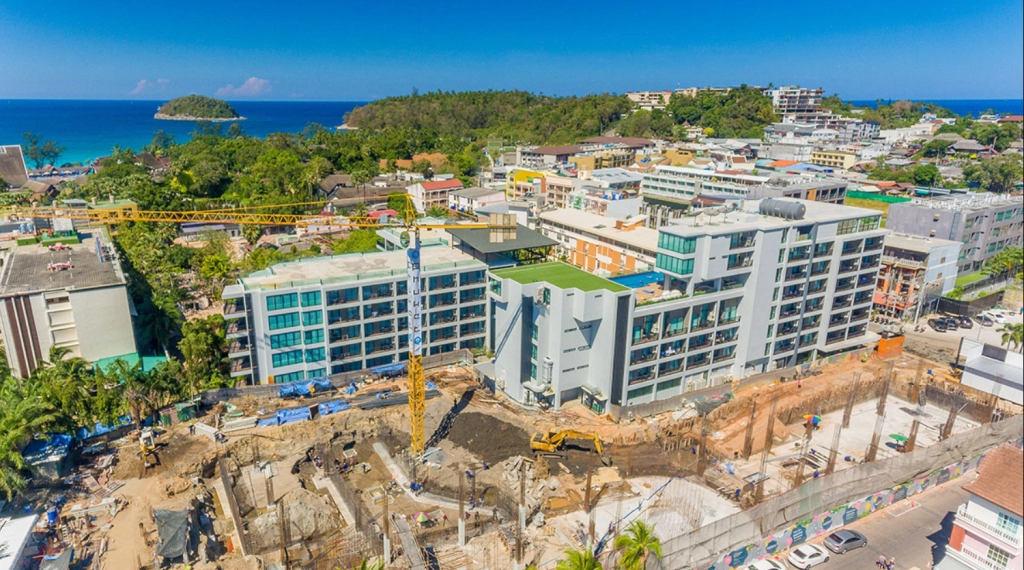 Aerial view of an off-the-plan condo under construction near the beach in Phuket, Thailand