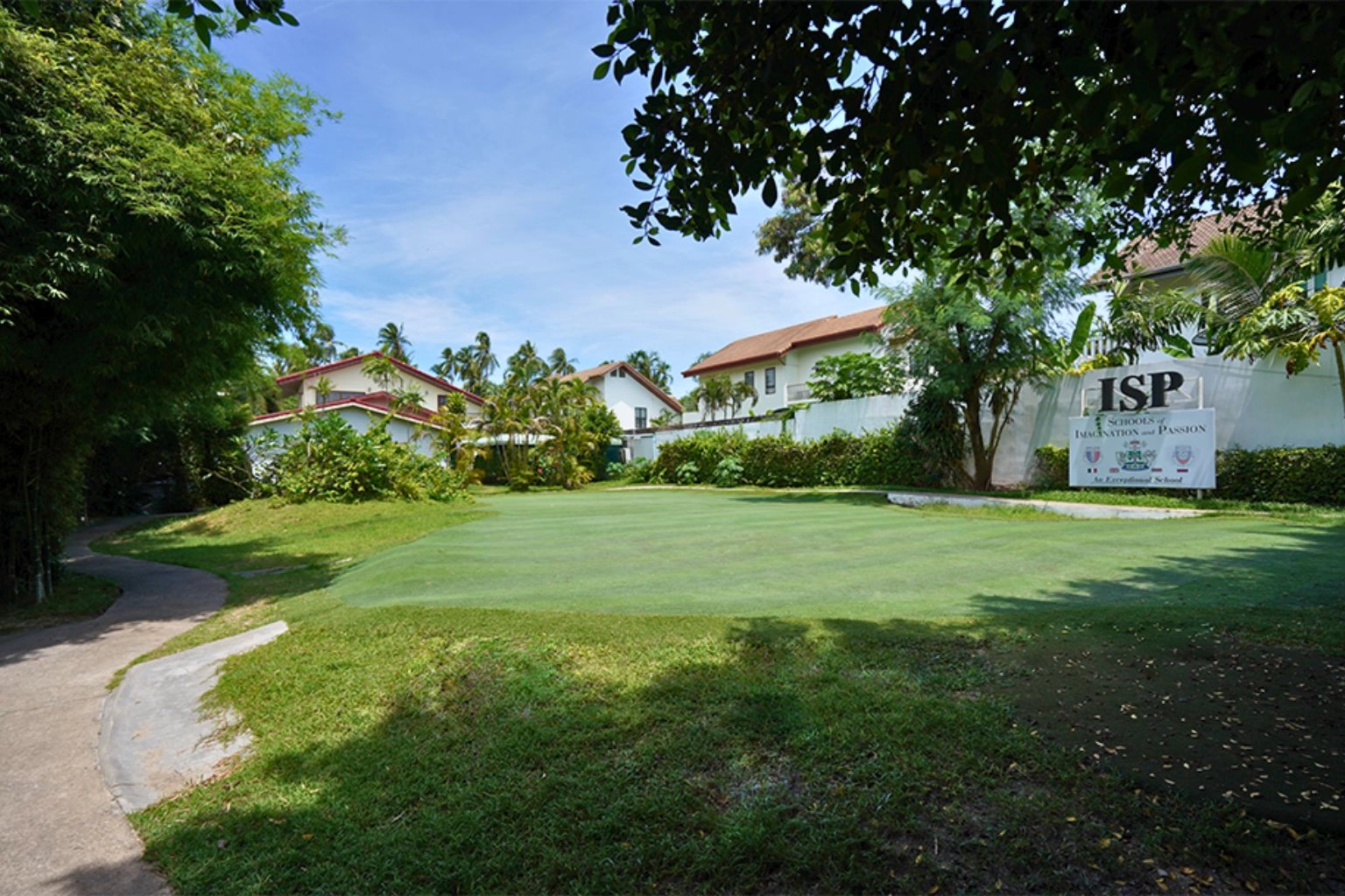 ISP International School of Phuket campus surrounded by greenery — a key consideration for families investing in Rawai & Nai Harn.
