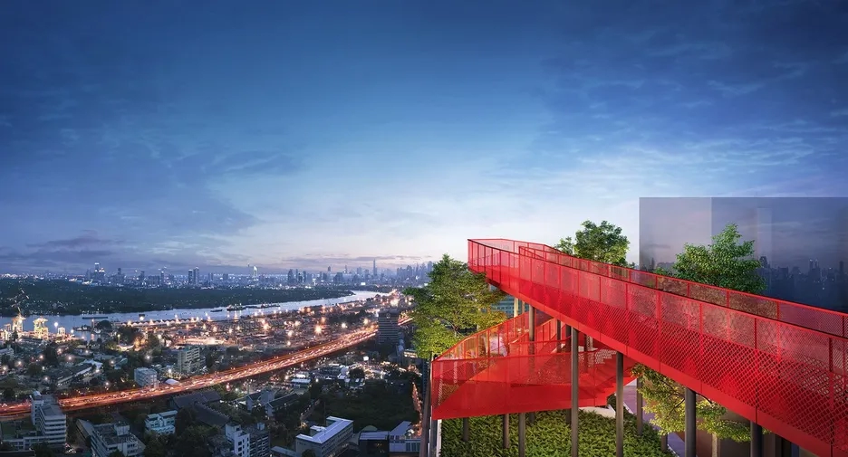 Modern red rooftop walkway overlooking Bangkok cityscape and expressway, showcasing innovative condo design and investment potential.