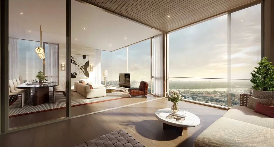 Spacious luxury Bangkok condominium interior with panoramic river views, elegant furnishings, and floor-to-ceiling windows.