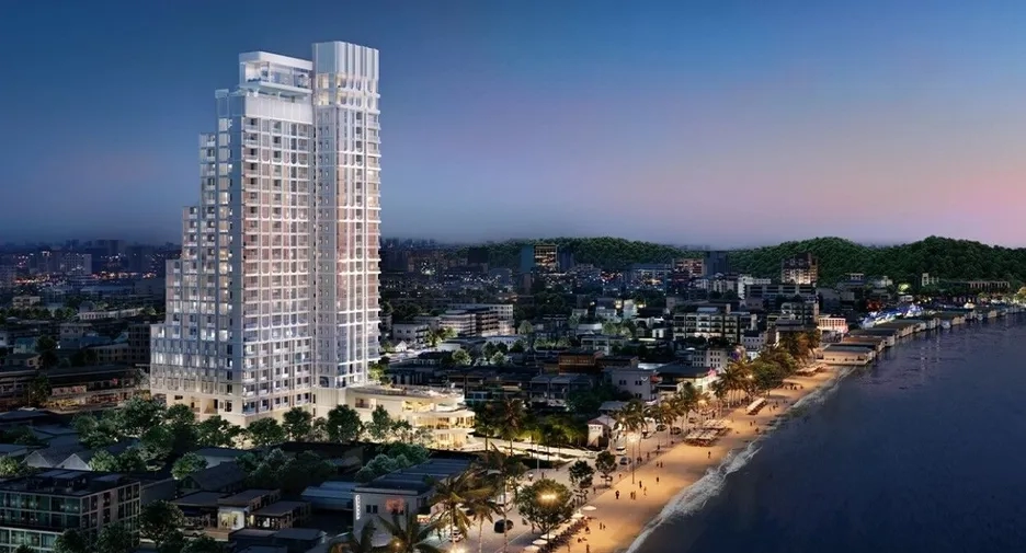 Luxury beachfront condominium tower, ideal for real property investment and building wealth through real estate in a prime location.