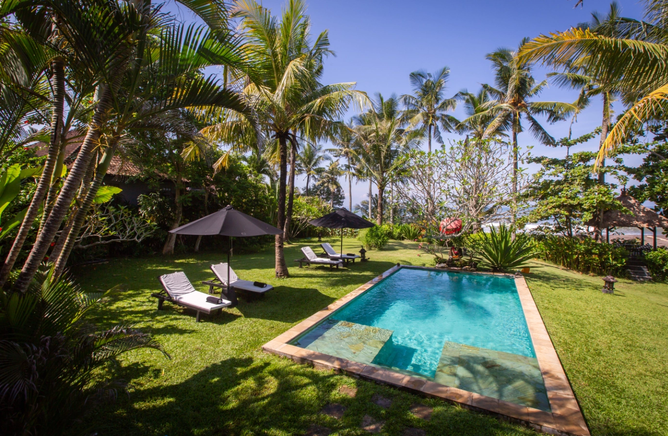 Luxury Bali Canggu villa with private pool and tropical garden, ideal for high-return properties to invest in Southeast Asia.