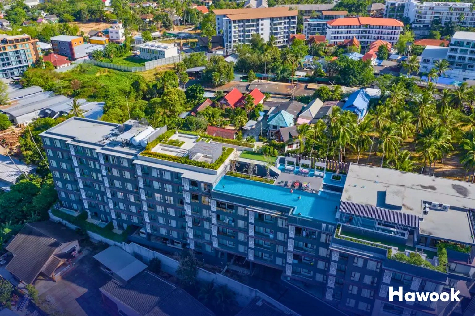 A cluster of modern condo projects in Karon, illustrating Phuket property supply in 2025