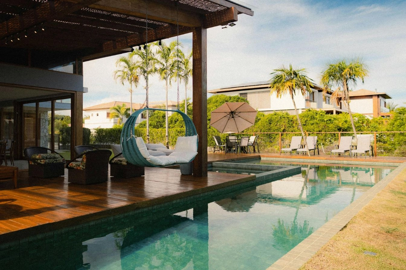 Villa living area opening to terrace and private pool in Phuket, featured in Condos vs Villas in Phuket comparison