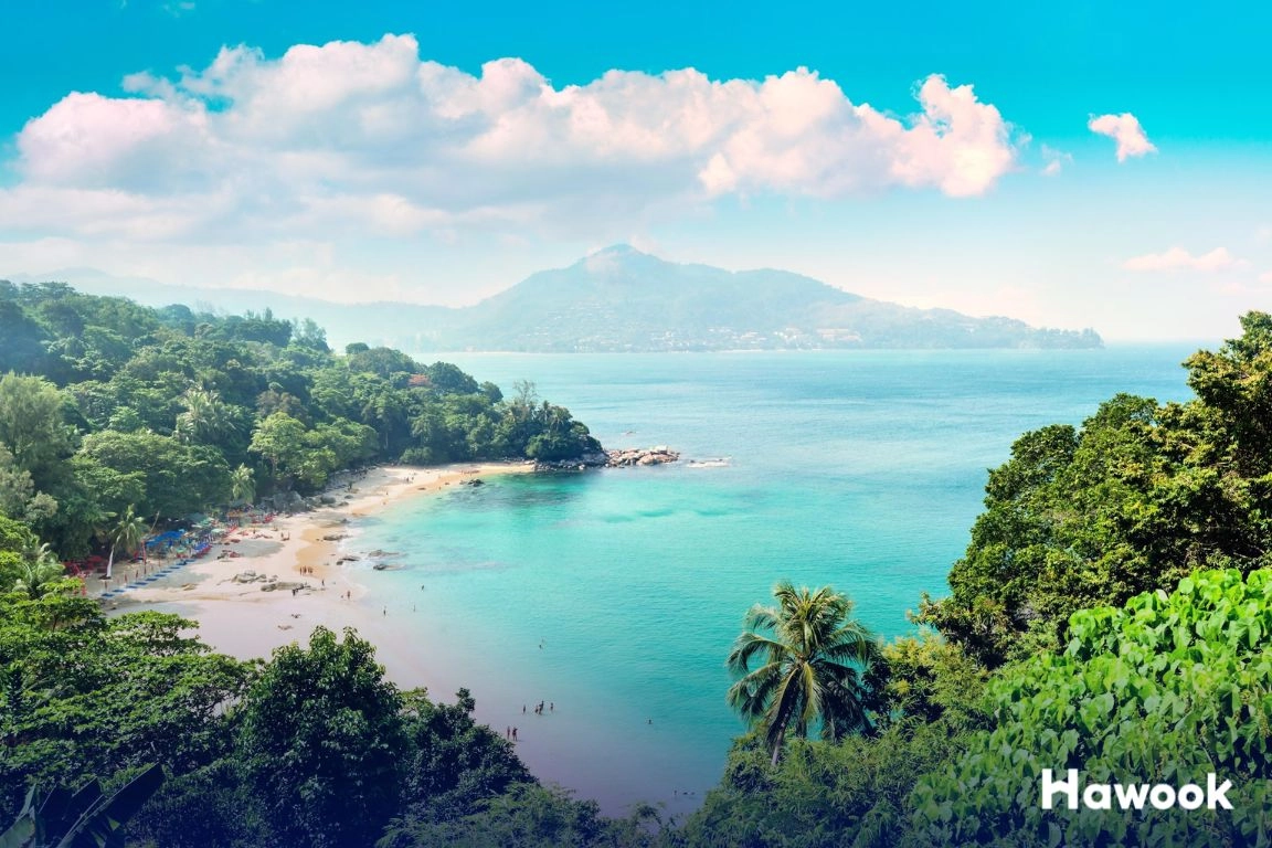 Aerial view of Kamala Beach in Phuket, Thailand, showing coastline and turquoise water, popular area for Phuket Property Investment.