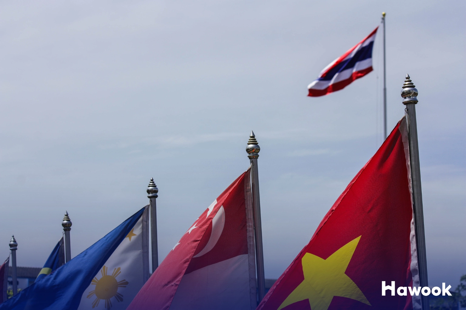 Southeast Asia national flags representing regional property market trends and investment landscape