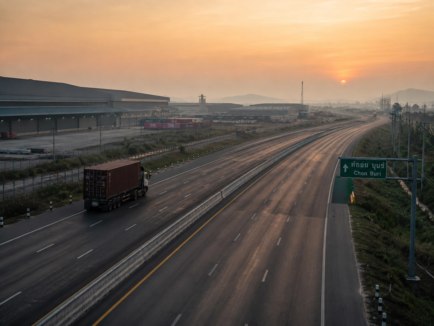 Major logistics highway and industrial corridor in Chonburi, Thailand during sunrise
